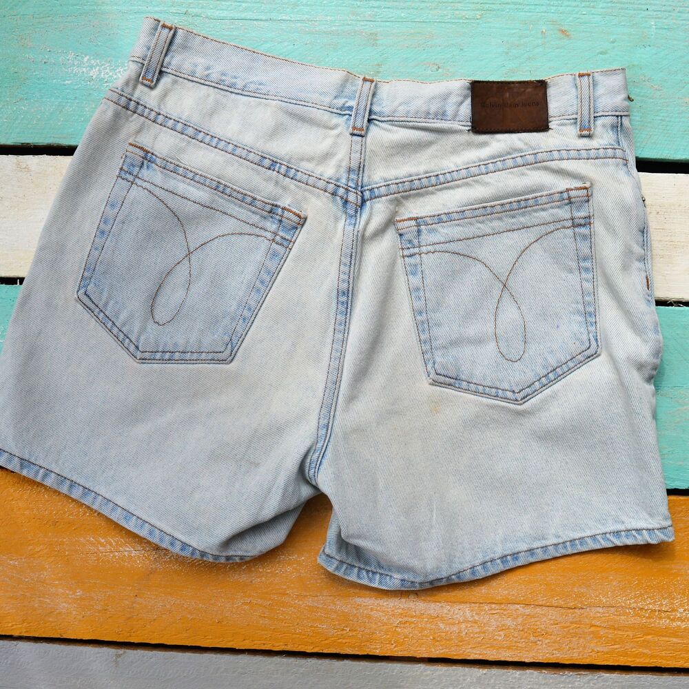 Calvin Klein High-Rise Jean Jorts Enzyme Wash Mom 1990s Light wash Denim Shorts